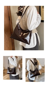 Detail of dark brown hobo tote bag featuring glossy crinkled leather and leather tag