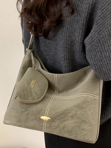 Olive grey oversized slouchy tote bag in soft suede-like fabric with contrast stitching