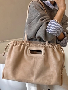 Sac fourre-tout minimaliste en daim abricot avec cordon et poignée ergonomique