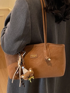 Vintage caramel brown suede tote bag for women with cute bear charm and shoulder strap