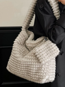 Soft faux fur cloud tote bag in beige with check pattern and matching coin purse charm
