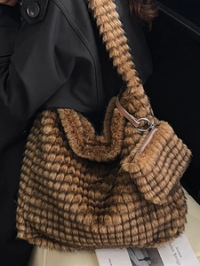 Brown faux fur pleated cloud tote bag with matching shoulder strap and small pouch