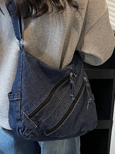 Sac fourre-tout minimaliste en denim bleu foncé pour femmes avec poches zippées et bandoulière