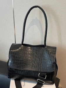 Fashionable black crocodile embossed tote bag for women with silver buckle shoulder strap