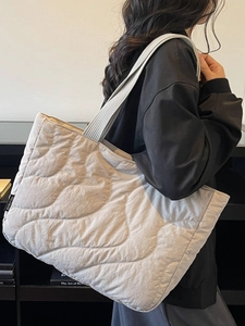 Lightweight grey quilted tote bag for women with minimalist wavy stitching and large capacity