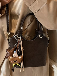 Dark brown suede bucket handbag for women with teddy bear charm and stars pendant