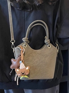 Vintage olive green bucket bag with twin knotted handles and cute bear charm set