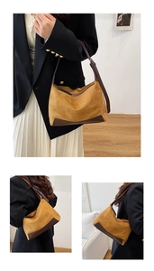 Detail of leopard print suede shoulder bag with adjustable strap and vintage zip closure