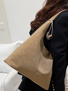 Minimalist camel suede tote bag for women showing spacious interior and shoulder carry style