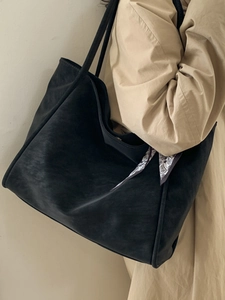 Vintage large black tote bag for women featuring a stylish paisley scarf on the strap