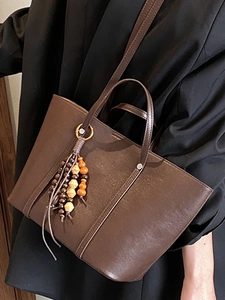 Large capacity dark brown tote bag with leather texture and wooden bead charm accessory