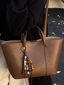Deep brown large capacity faux leather tote bag with ethnic tassel and bead charm