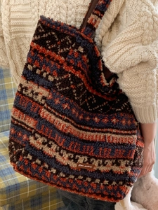 Ethnic pattern faux shearling tote bag for women shown with a cozy winter sweater