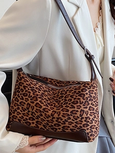 Trendy leopard print shoulder bag with brown leather trim and adjustable strap for women