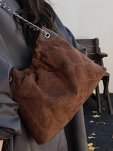 Brown suede quilted tote bag with golden chain strap for autumn fashion outfits