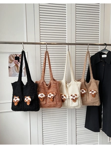 Detailed display of chunky knit tote bags in four colors with cute panda plush patches