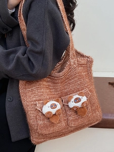 Brown knit tote bag with cat plush decor and dual flap pockets for casual winter style