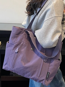 Large capacity purple nylon tote bag for women with multi-pocket design and strap