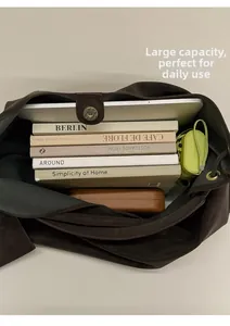 Large capacity dark brown tote bag showing interior storage for tablets and books