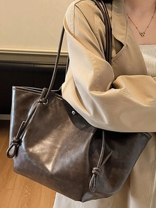 Minimalist large vintage coffee brown leather tote bag for women with knotted shoulder straps