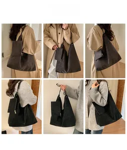 Detail view of large capacity matte hobo bag and pouch set in brown and black