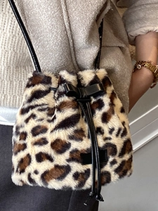 Chic leopard print faux fur bucket bag with black bow and drawstring for winter fashion