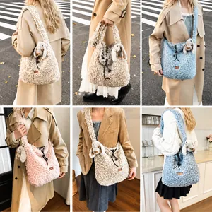 Detail showing plush fleece tote bags with drawstring closure and cute rabbit charm