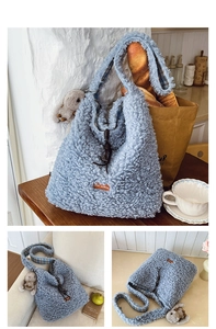 Macro shot of light blue teddy fur shoulder bag with vintage leather tag and plush rabbit charm