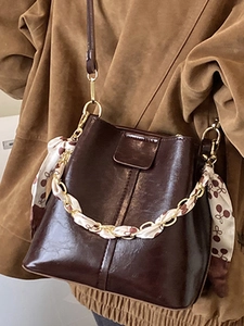 Minimalist large bucket bag in dark brown PU leather with cherry pattern silk scarf handle
