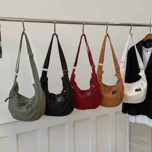 Nylon half-moon crossbody bags in five colors including olive green and burgundy