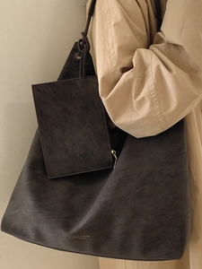 Large dark grey matte leather tote bag for women with matching coin purse and gold logo