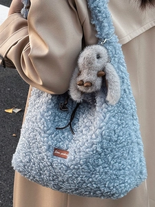 Winter light blue faux fur tote bag with rabbit charm and brown leather patch