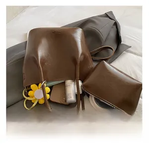 Interior view of the brown leather bucket bag showing large capacity for essentials