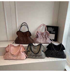 Detailed view of fashionable tote bags in leopard and polka dot patterns with chic prints