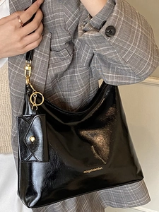 Retro black faux leather tote bag for women with gold hardware and small pouch