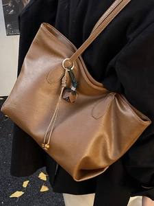 Vintage brown large capacity PU leather tote bag with floral tassel charm for autumn fashion