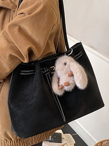 Retro black tote bag with white contrast stitching and a cute bunny charm for women