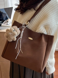 Brown large capacity tote bag with teddy bear charm and tassel for daily commute