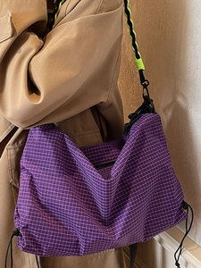 Large purple checkered hobo tote bag with woven shoulder strap for casual daily use