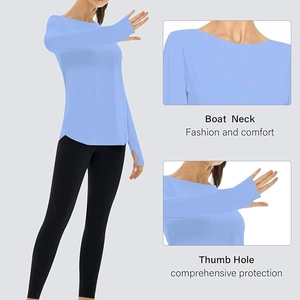 Detail view of light blue yoga shirt with boat neck design and functional thumb holes