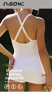 Back view of a white tennis dress with criss-cross straps and sweat-wicking fabric