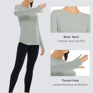 Detail view of boat neck and thumb hole design on light gray UV protective yoga shirt