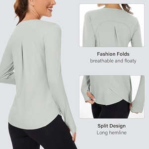Detail of light green yoga top with fashion folds on the back and split curved hemline