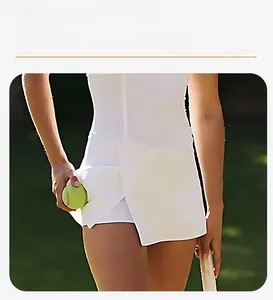 Detail of white tennis dress showing asymmetric flare skirt and functional side pocket