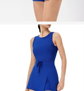 Detail of navy blue backless tennis dress with side slit and inner shorts for sports