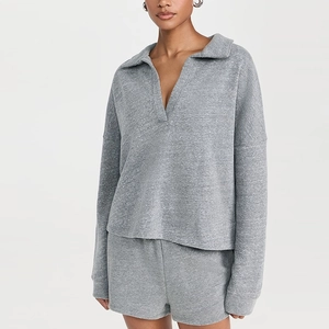 Casual grey two-piece set featuring a loose V-neck long sleeve top and elastic waist shorts