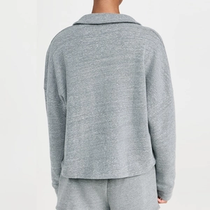 Back view of women's grey heather knit lounge set featuring a loose long sleeve polo and shorts