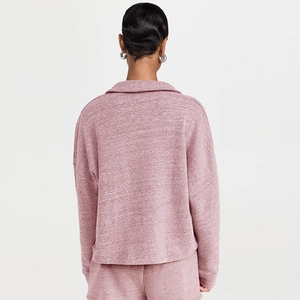 Rear view of pink long sleeve polo sweatshirt and matching lounge shorts set