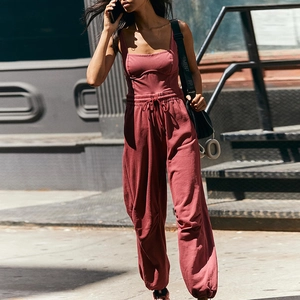 Detail of high-waist drawstring joggers and matching vest in soft dark red cotton blend