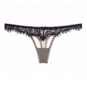 Detailed view of women's black eyelash lace thong with bow accent and beige panel
